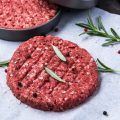 Prepared Beef Burgers with Burger Press. BBQ and Grill Meat Food.